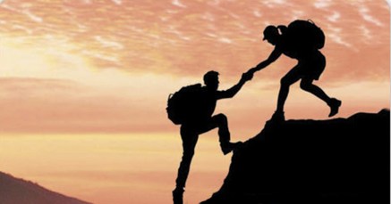 Woman helping man up